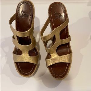 Christian Louboutin gold wedges